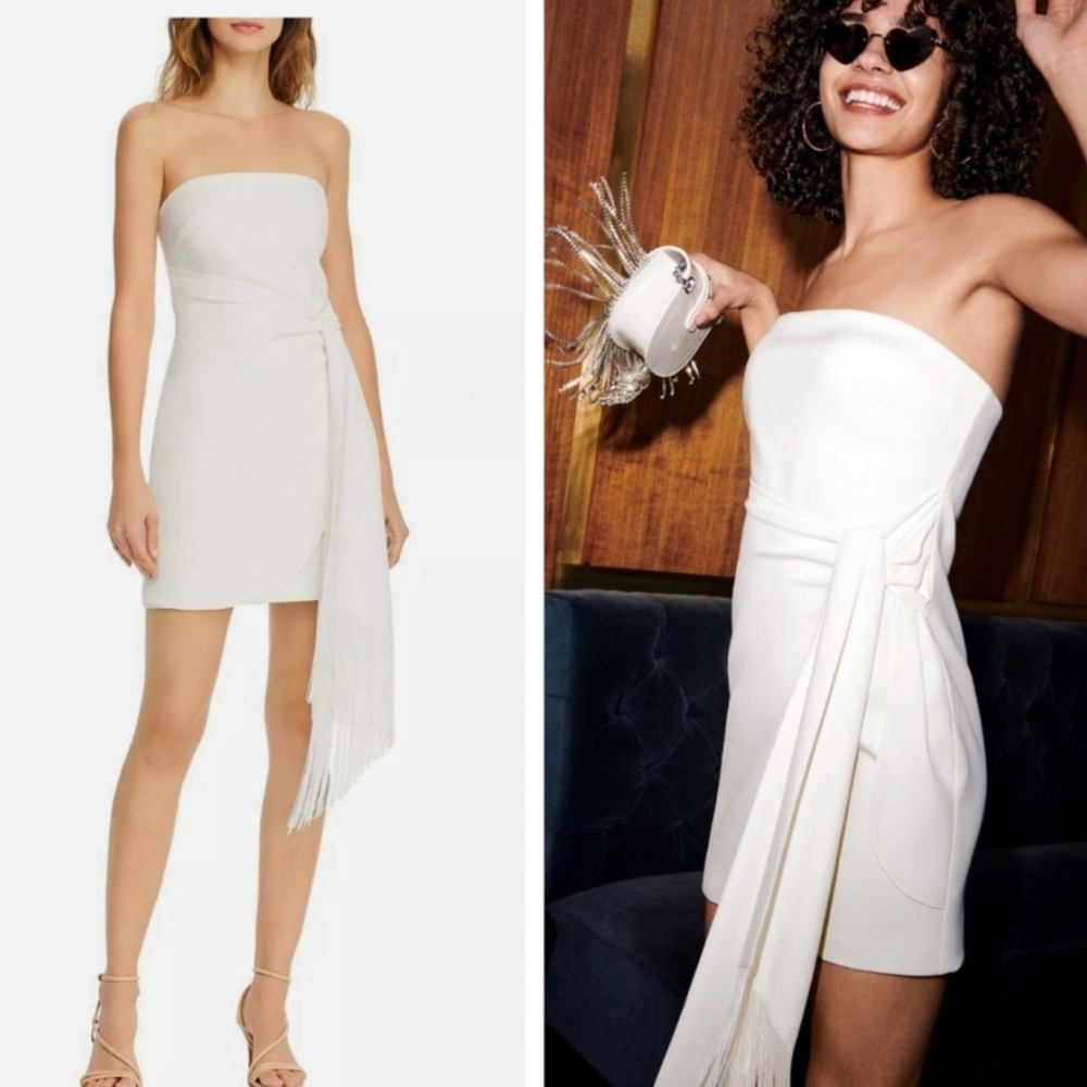 Likely white dress, strapless, never worn